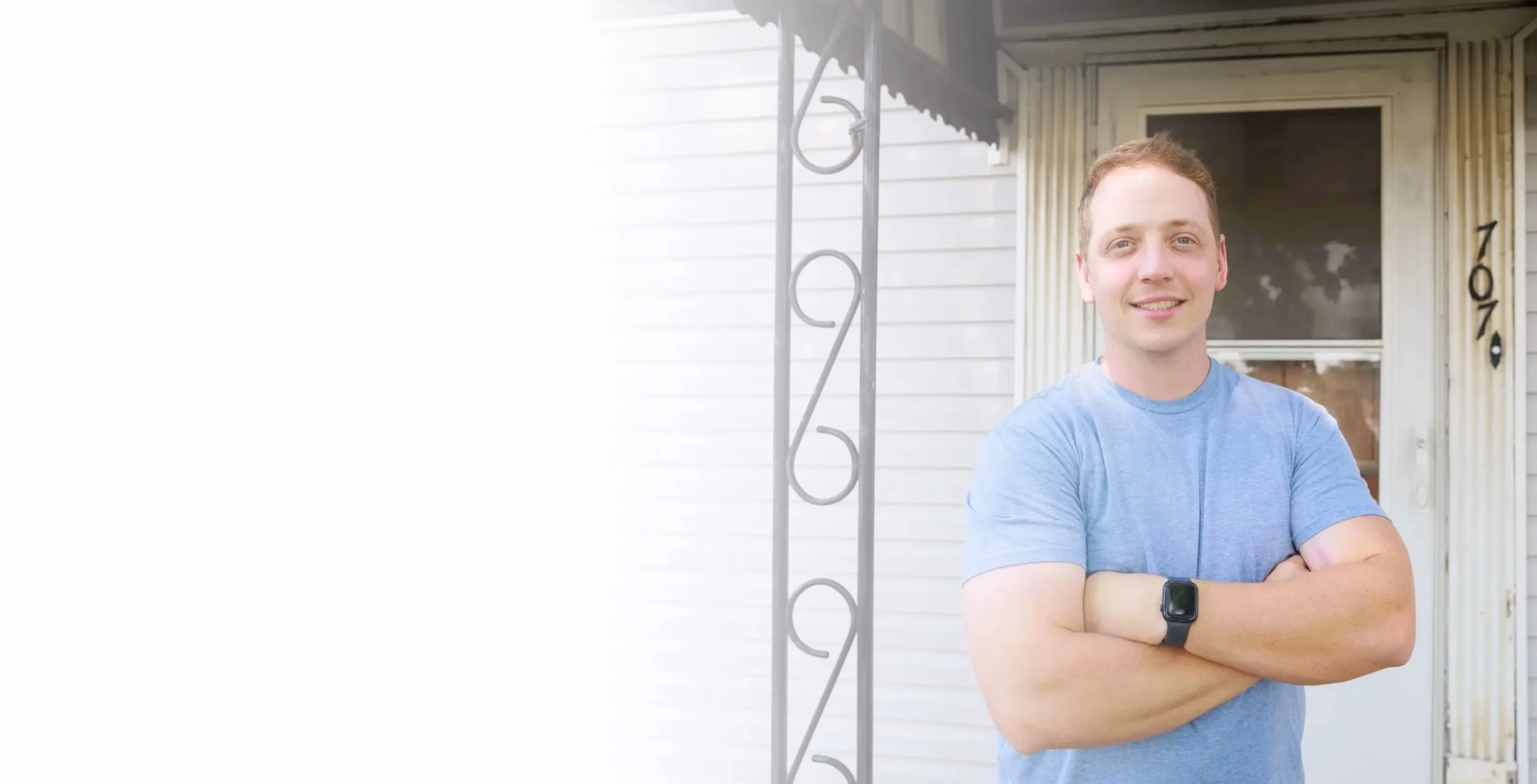 Patrick Fitzgerald, Cincinnati cash home buyer, standing in front of a house